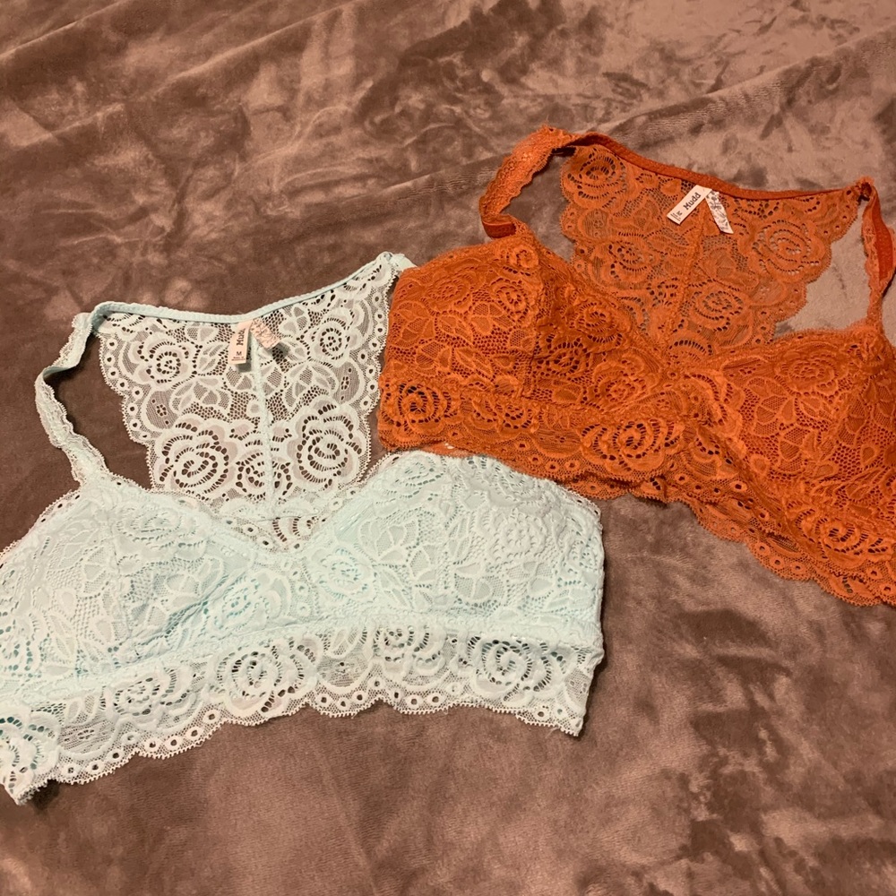 Set of 4 lace bralettes.